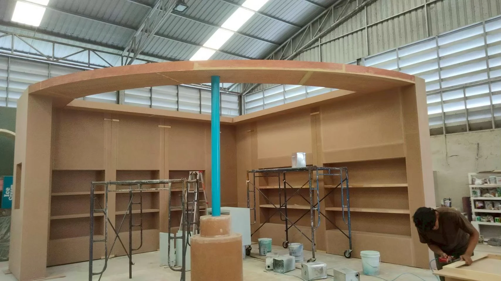 Full-size curved exhibition stand being built in the Time Service production workshop